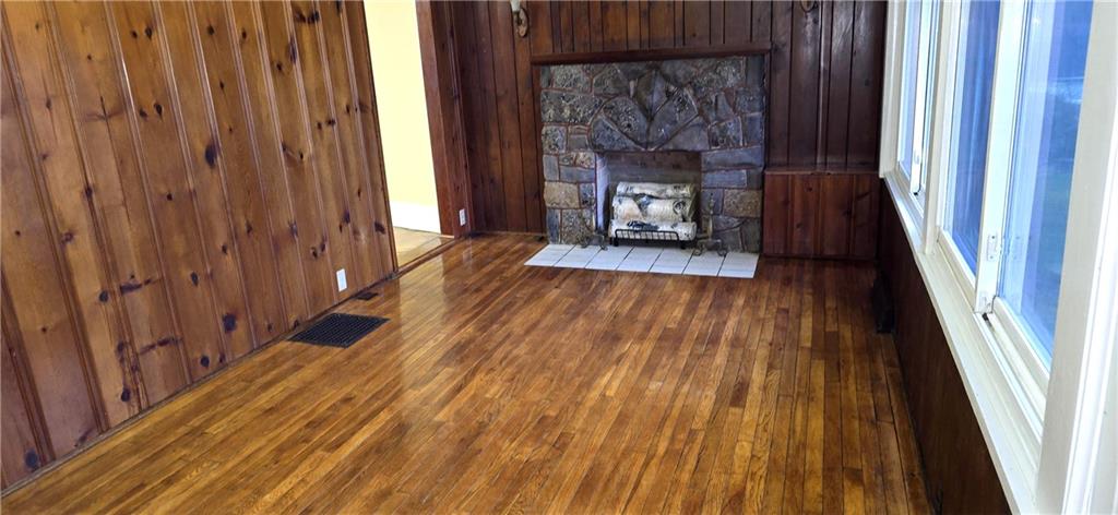 64 Old Rte 36 Road Punxsutawney, PA 15767 - Photo 7 of 12 a hallway with wooden floor table and chairs