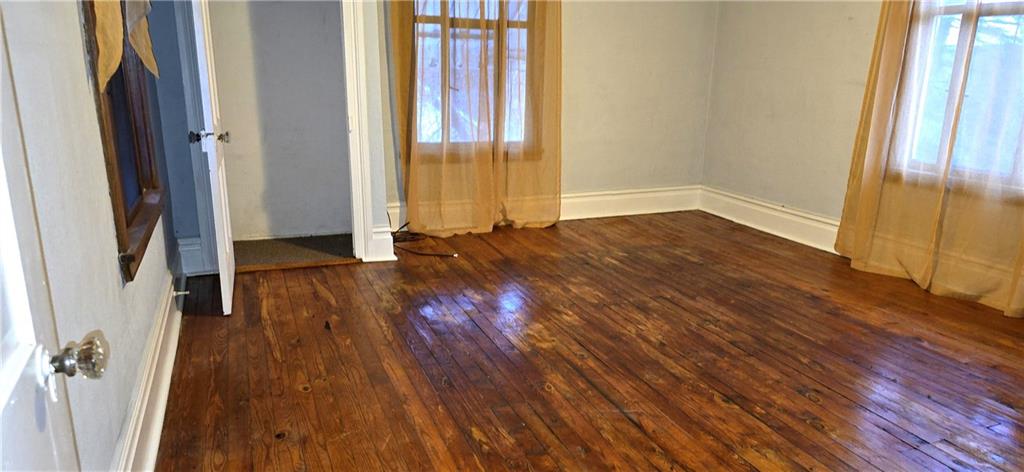 64 Old Rte 36 Road Punxsutawney, PA 15767 - Photo 8 of 12 an empty room with wooden floor and entrance