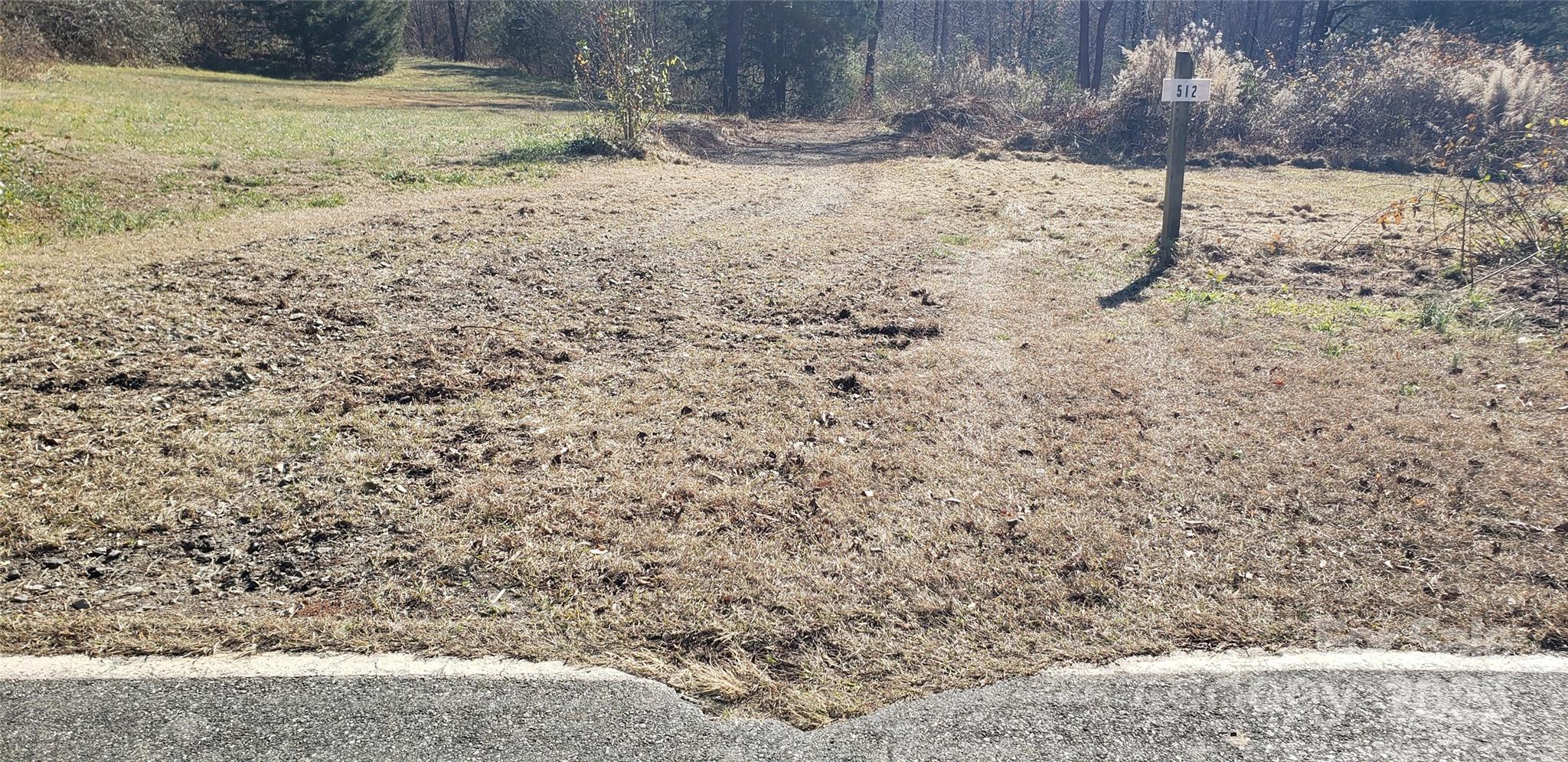 512 Hemphill Road Union Mills, NC 28167 - Photo 2 of 16 a view of a backyard of a house