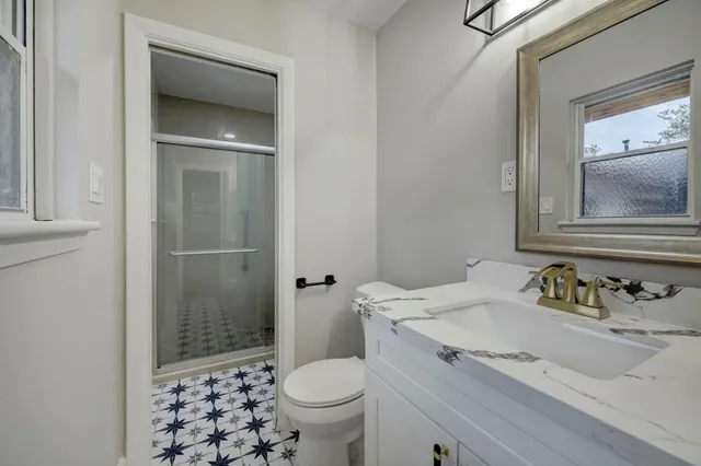 a view of a room with wooden floor and staircase