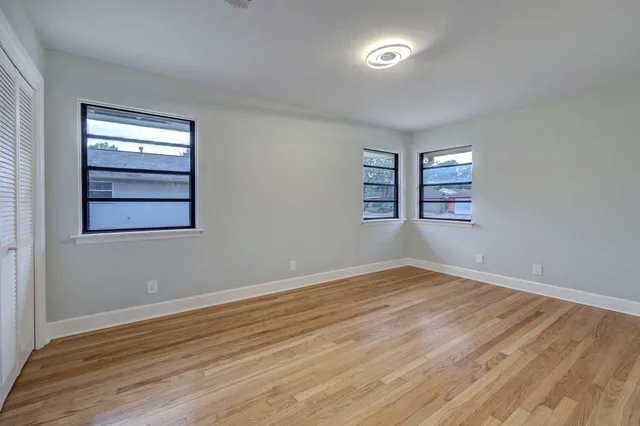 a view of backyard with tree
