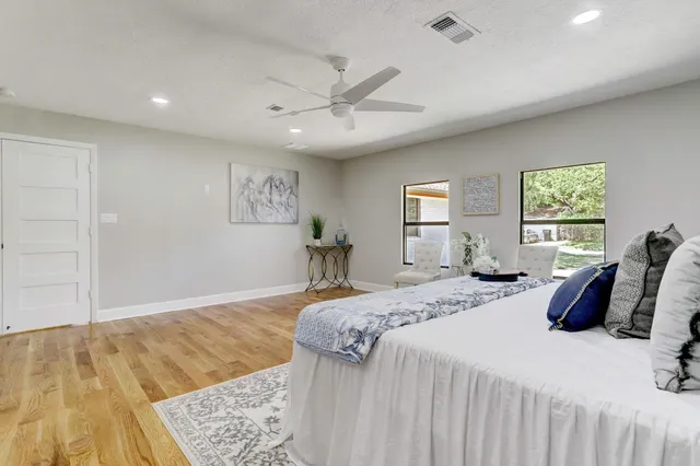 a bathroom with a bathtub and shower