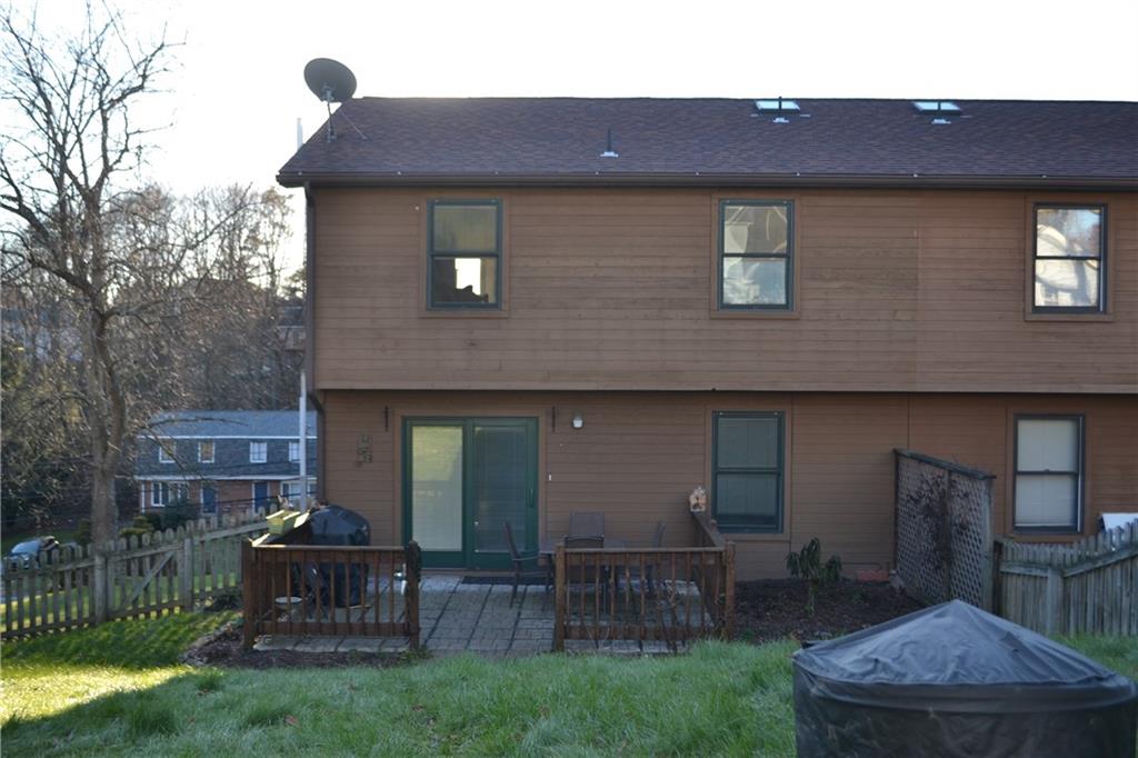 9252 Highland Road Pittsburgh, PA 15237 - Photo 17 of 17 Closer view of brick patio and back of home.