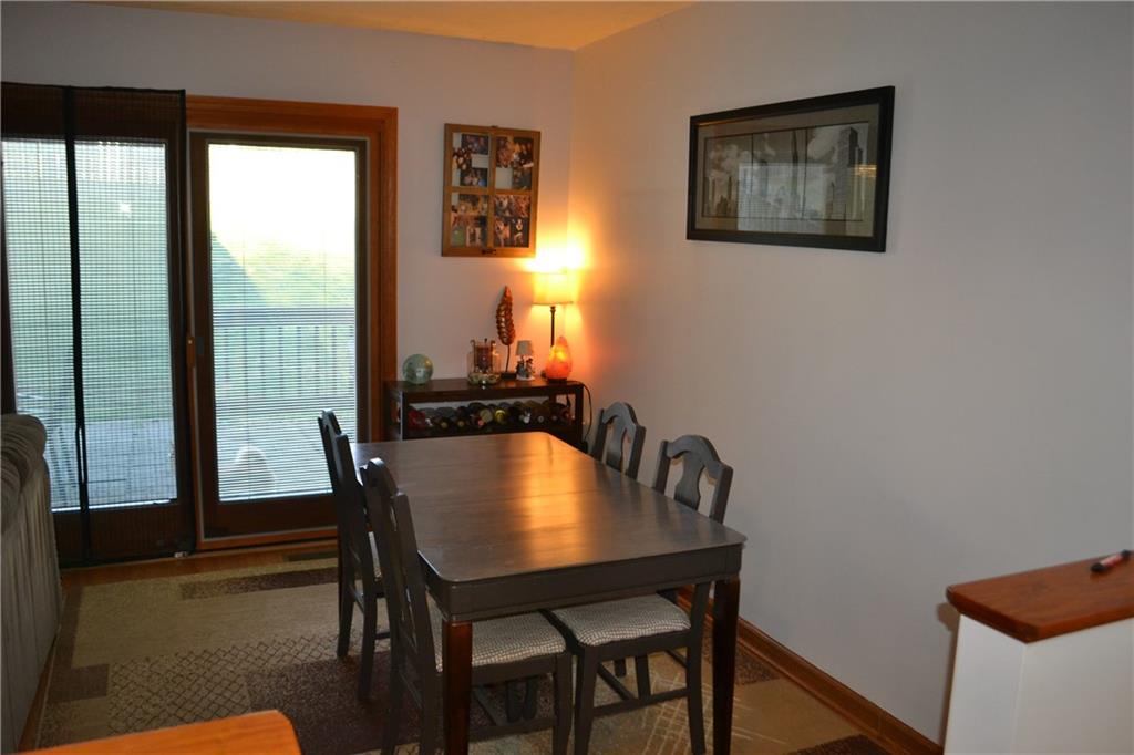 9252 Highland Road Pittsburgh, PA 15237 - Photo 5 of 17 11x9 Dining room with hardwood flooring and access to the back patio.