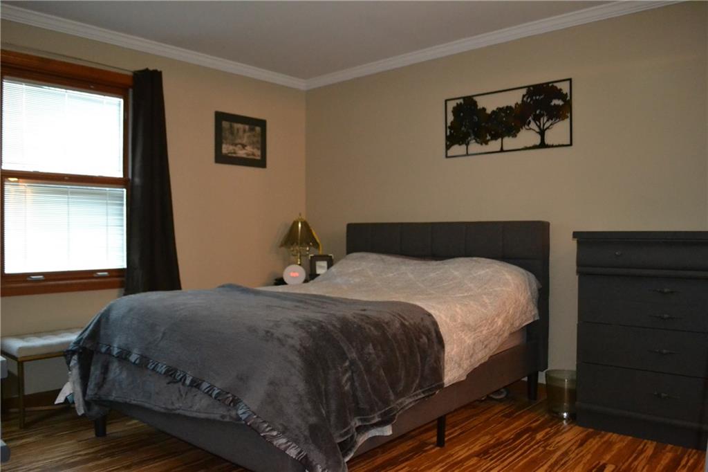 9252 Highland Road Pittsburgh, PA 15237 - Photo 10 of 17 13x12 Master bedroom with crown molding, bamboo flooring and a spacious 7x5 walk-in closet with skylight.