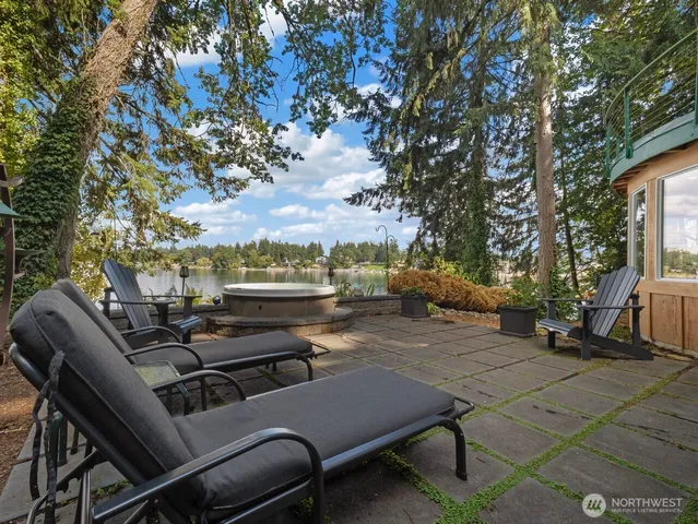 a view of a terrace with chairs