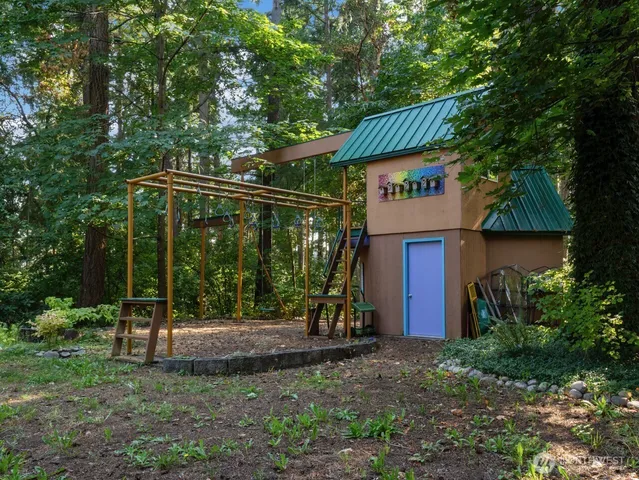 a view of a lake with sunset