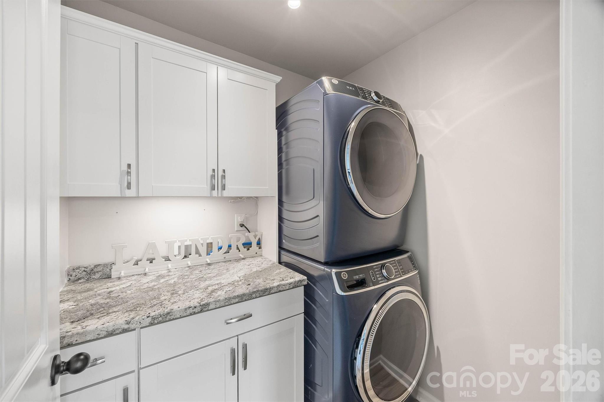 299 Annatto Way Tega Cay, SC 29708 - Photo 39 of 46 a utility room with sink dryer and washer