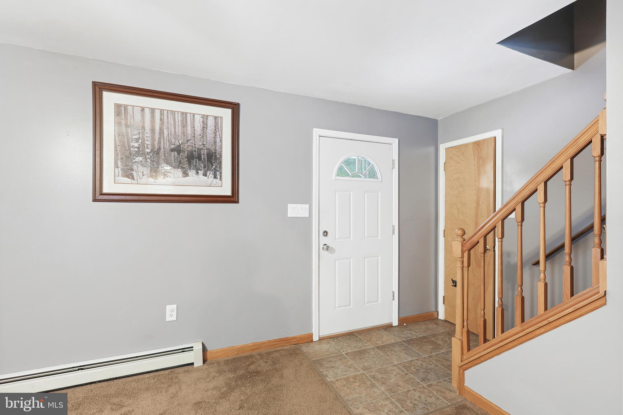 2021 Frostburg Road Frostburg, MD 21532 - Photo 13 of 67 a view of an empty room with window and stairs