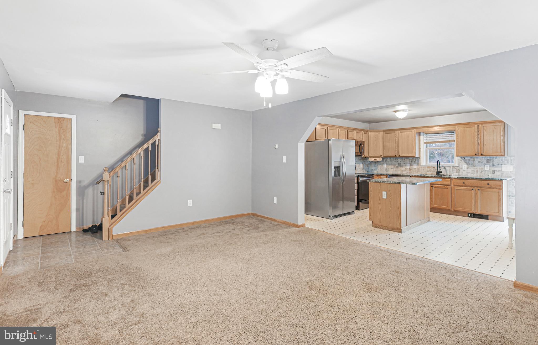 2021 Frostburg Road Frostburg, MD 21532 - Photo 14 of 67 a view of a kitchen with a sink and stainless steel appliances