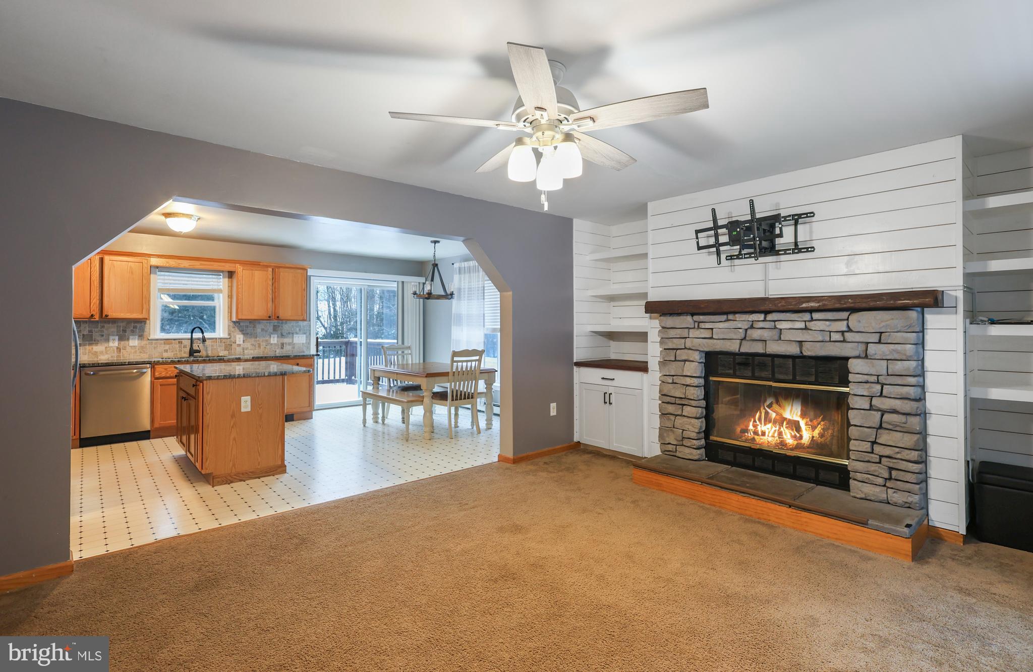 2021 Frostburg Road Frostburg, MD 21532 - Photo 18 of 67 a living room with furniture and a fireplace
