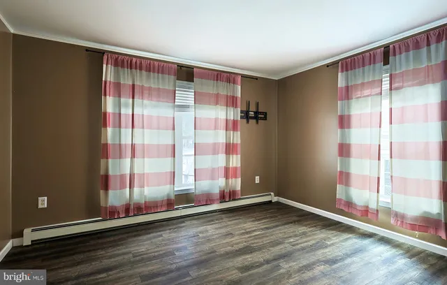 a bathroom with a sink vanity and mirror