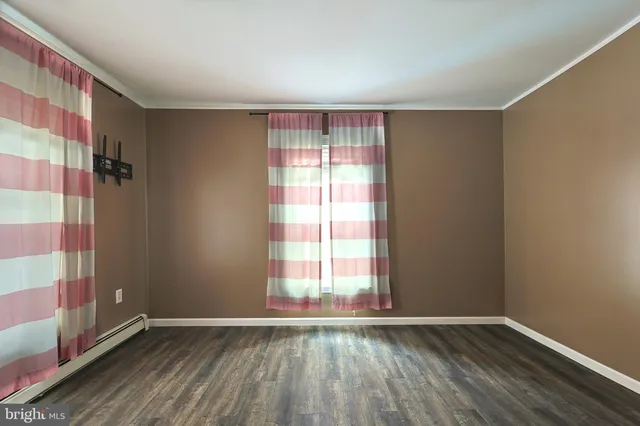 a bathroom with a bathtub and a sink