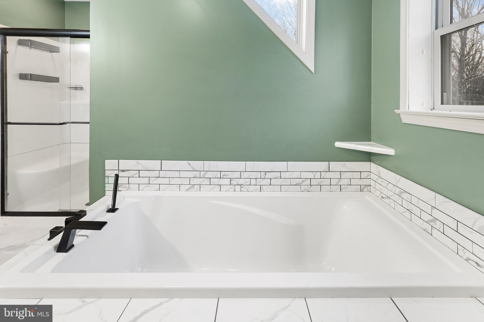 2021 Frostburg Road Frostburg, MD 21532 - Photo 38 of 67 a bathroom with a bathtub