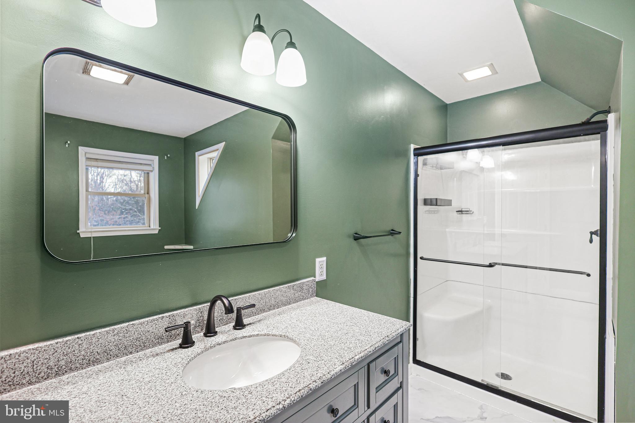 2021 Frostburg Road Frostburg, MD 21532 - Photo 39 of 67 a bathroom with a sink and a mirror