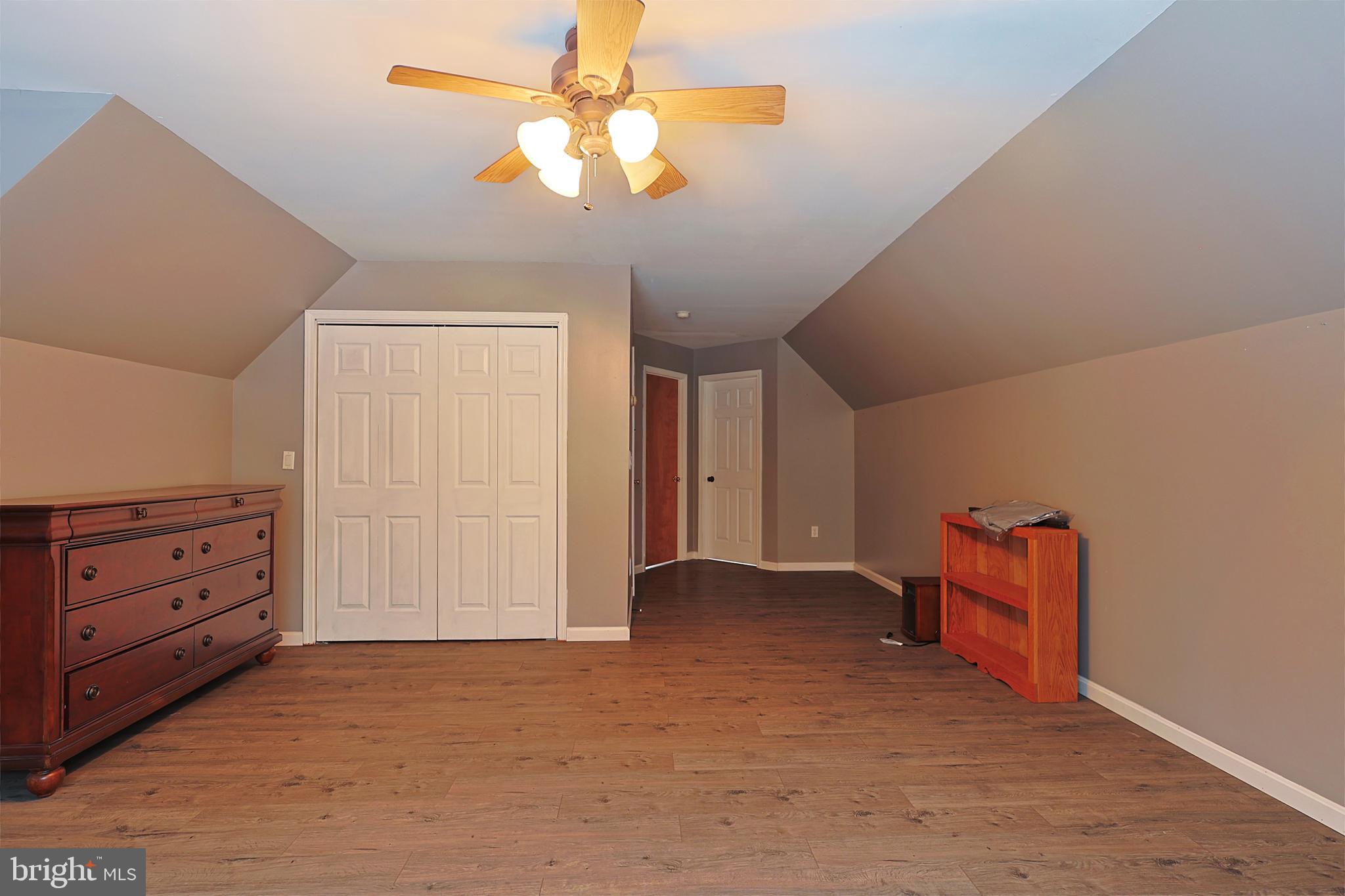 2021 Frostburg Road Frostburg, MD 21532 - Photo 42 of 67 wooden floor in an empty room with a window