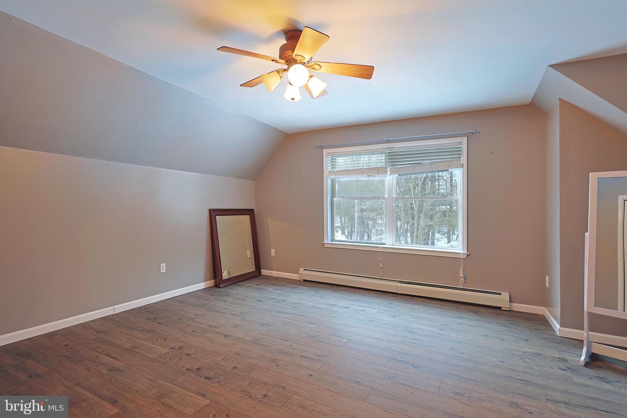 2021 Frostburg Road Frostburg, MD 21532 - Photo 43 of 67 wooden floor in an empty room with a window