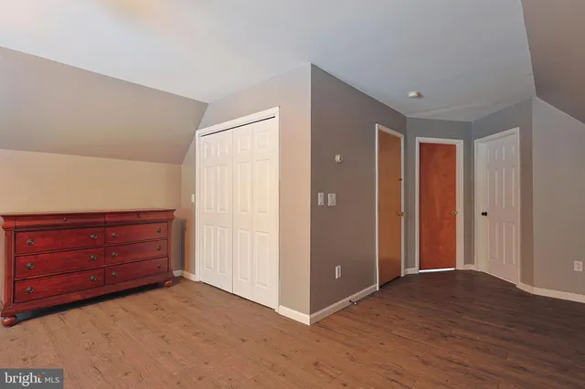 a view of a hallway with washer and dryer