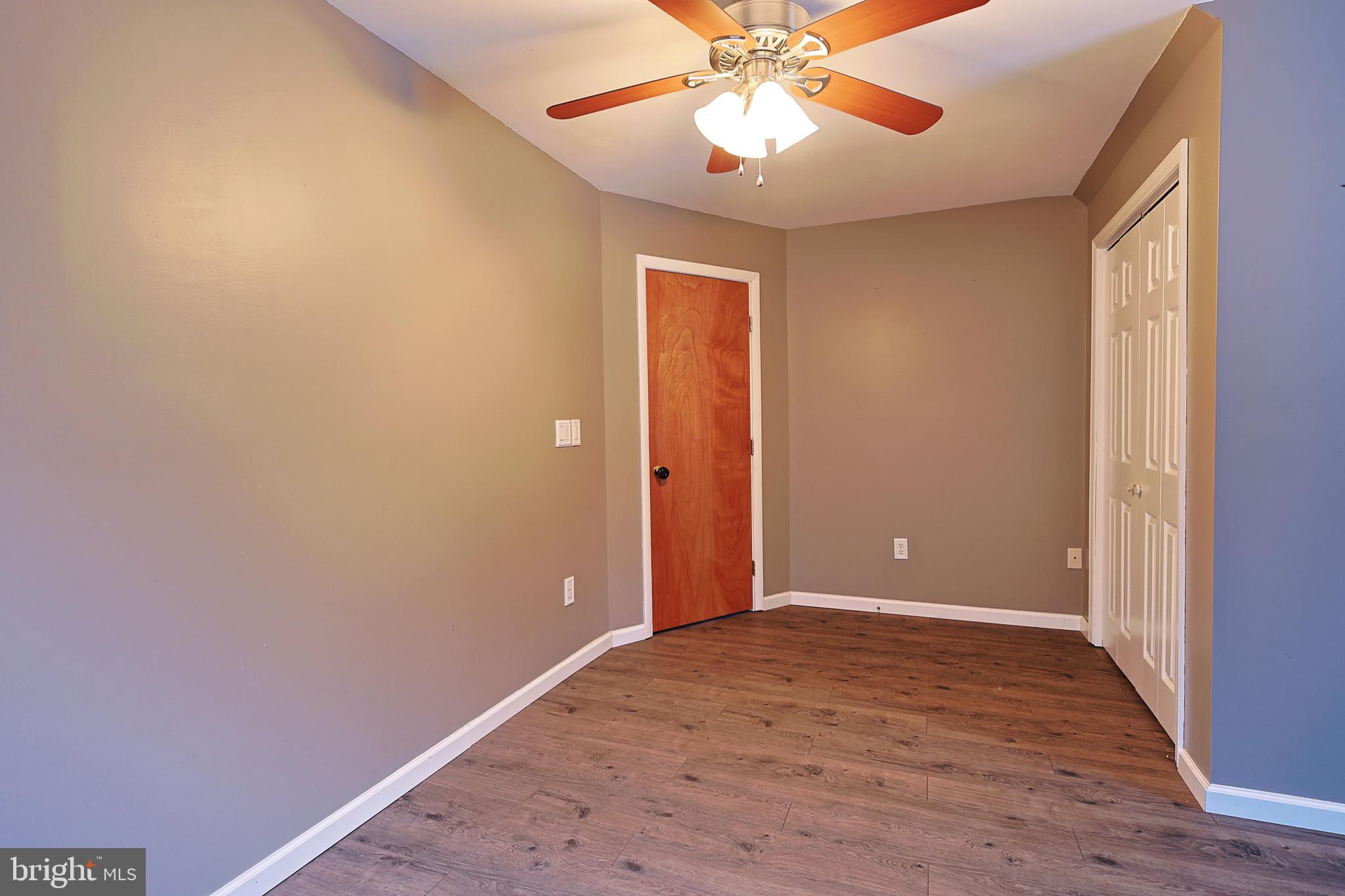 2021 Frostburg Road Frostburg, MD 21532 - Photo 46 of 67 wooden floor in an empty room with a window