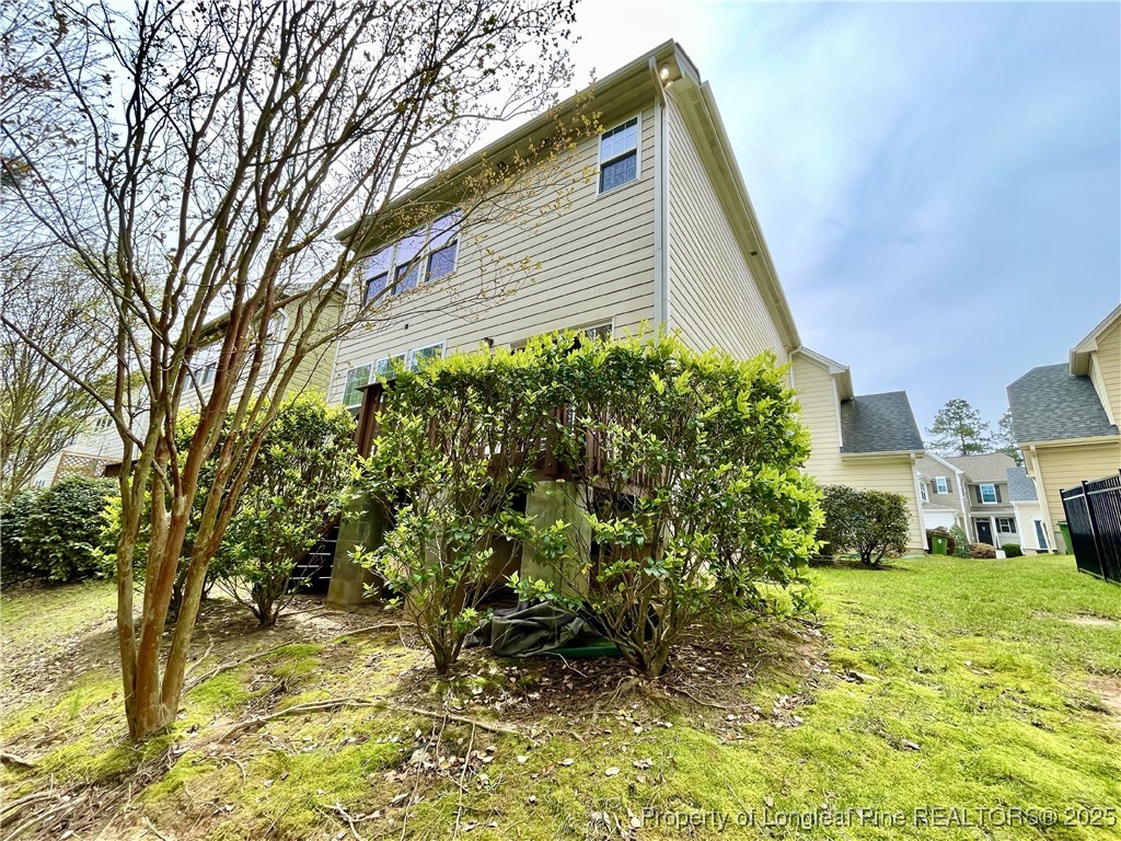 148 Pine Hawk Drive Spring Lake, NC 28390 - Photo 20 of 22 a view of a house with a yard