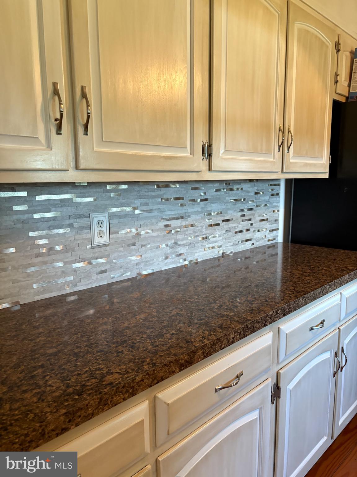 90 Upper Valley Road Christiana, PA 17509 - Photo 12 of 36 a kitchen with granite countertop a sink and white cabinets