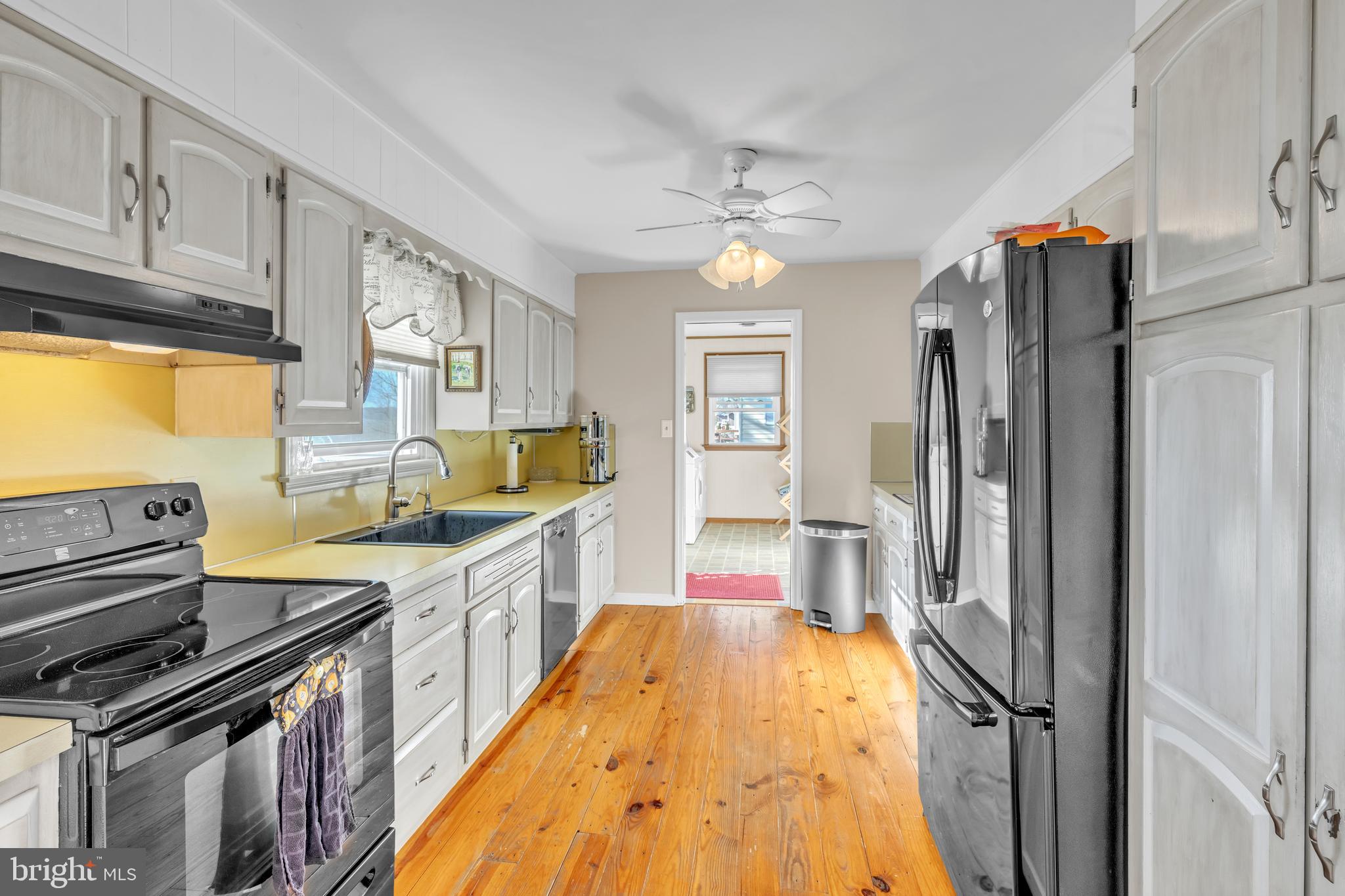 90 Upper Valley Road Christiana, PA 17509 - Photo 13 of 36 a kitchen with stainless steel appliances granite countertop a stove and a refrigerator