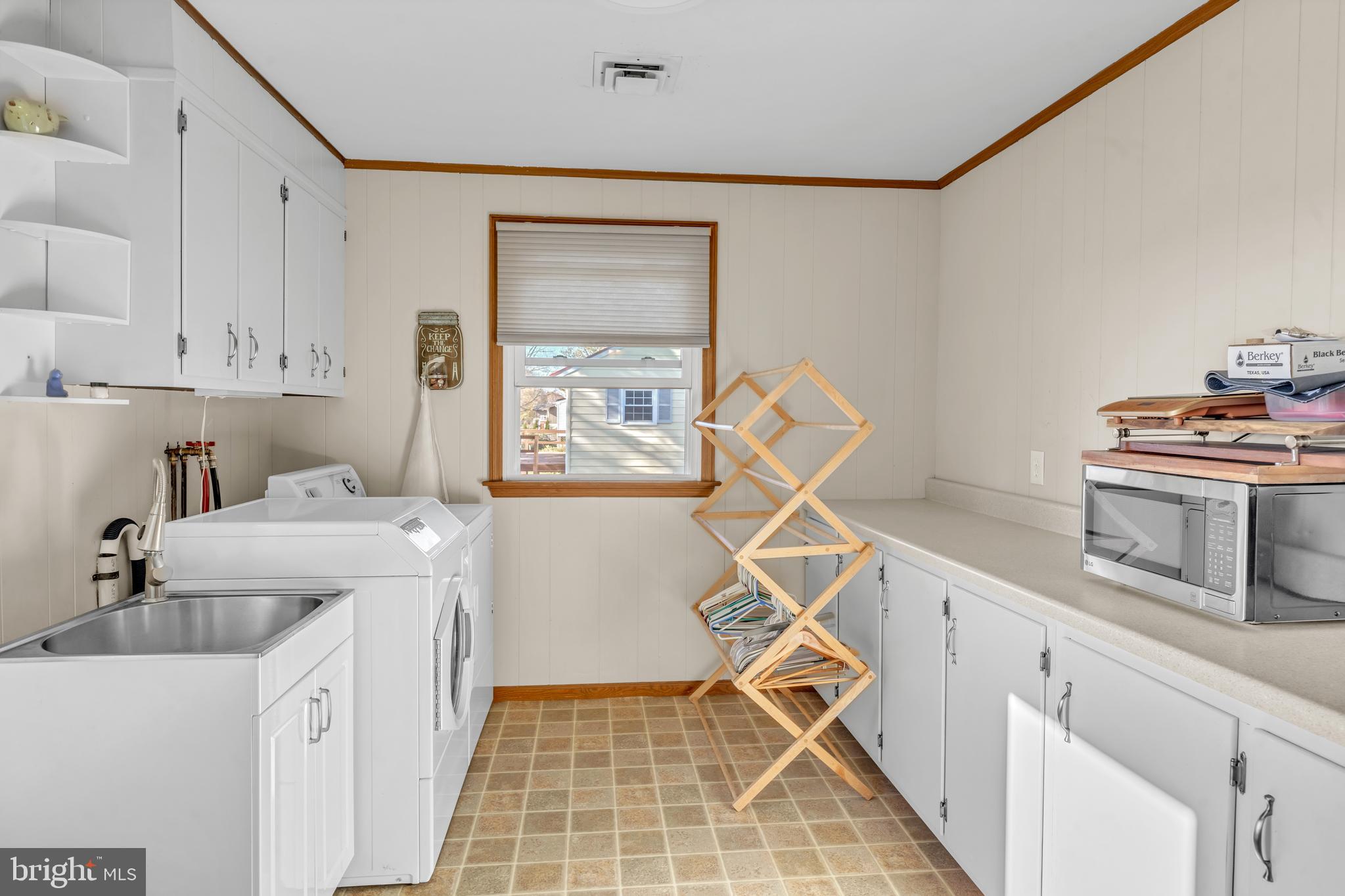 90 Upper Valley Road Christiana, PA 17509 - Photo 16 of 36 a kitchen with a sink a stove and cabinets