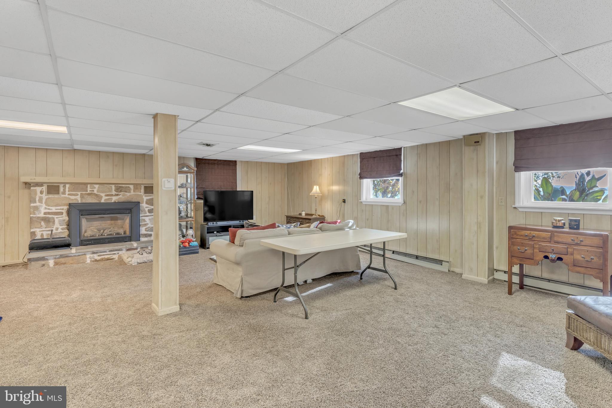 90 Upper Valley Road Christiana, PA 17509 - Photo 23 of 36 a view of a livingroom with furniture and a fireplace