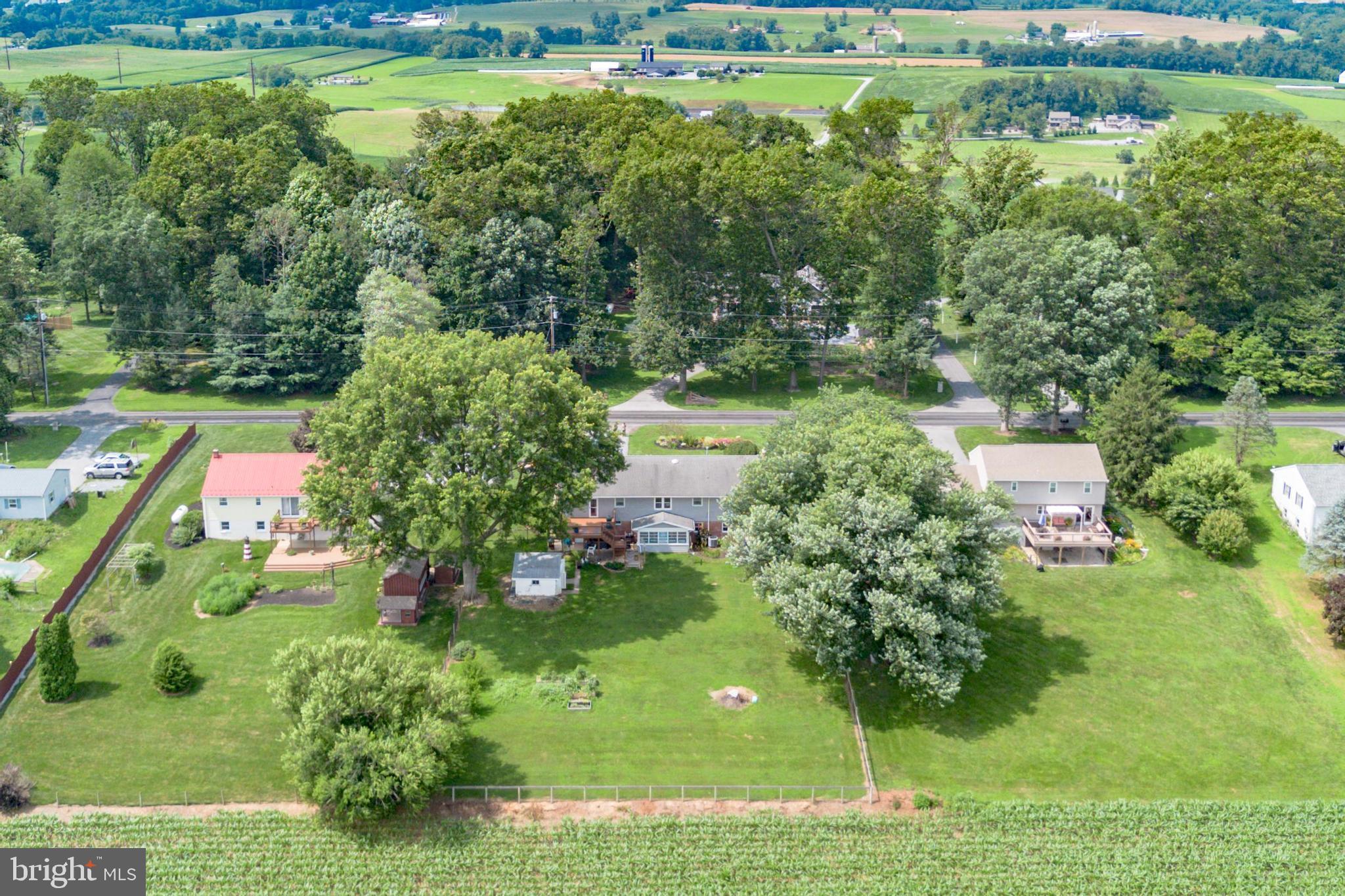 90 Upper Valley Road Christiana, PA 17509 - Photo 33 of 36 an aerial view of a golf course with a garden