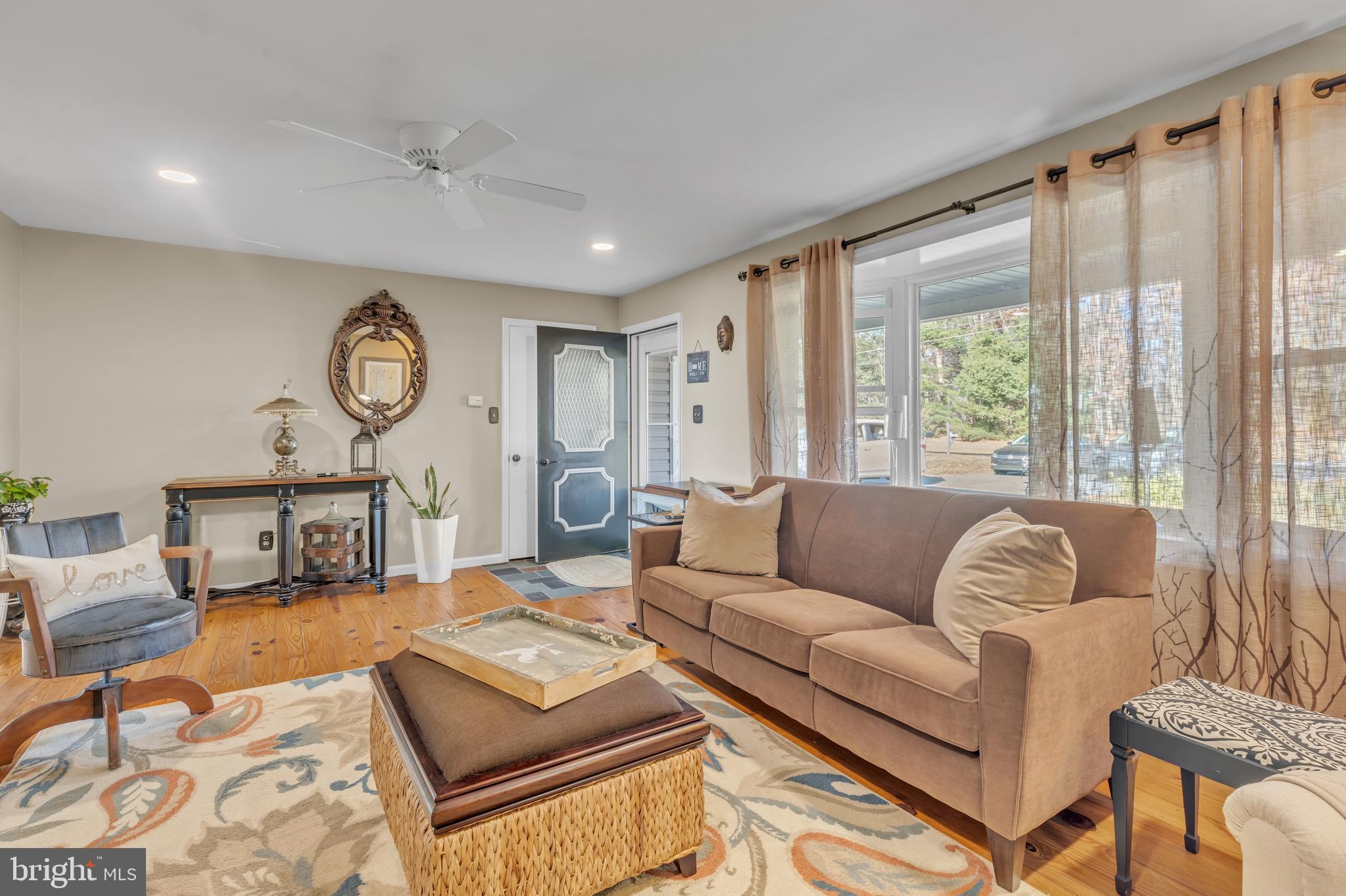 90 Upper Valley Road Christiana, PA 17509 - Photo 4 of 36 a living room with furniture and a large window