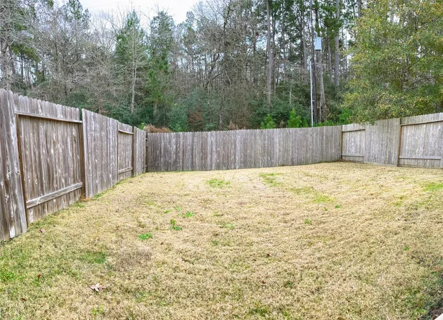 $1,499 | 56 Woodland Hills Drive, Unit A, Conroe, TX 77303