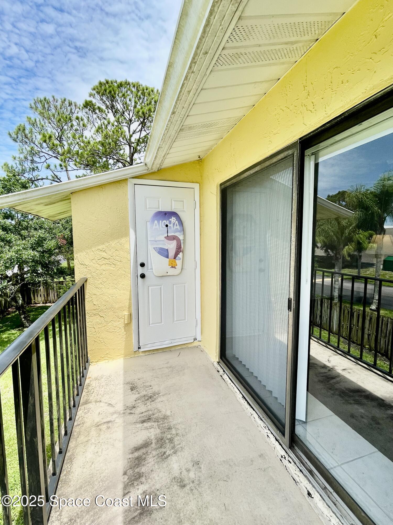 594 North Wickham Road, Unit 2 Melbourne, FL 32935 - Photo 26 of 42 a view of a porch