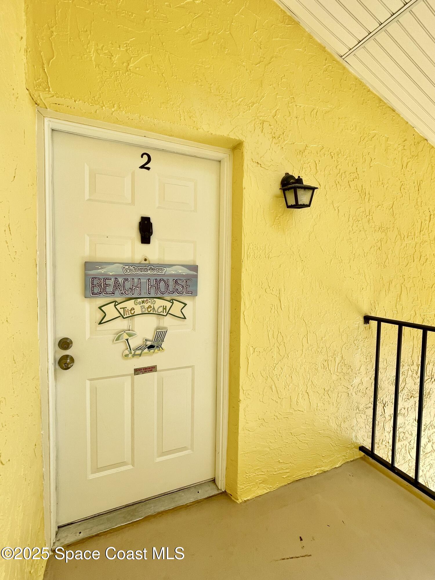 594 North Wickham Road, Unit 2 Melbourne, FL 32935 - Photo 3 of 42 a view of a bathroom with a shower