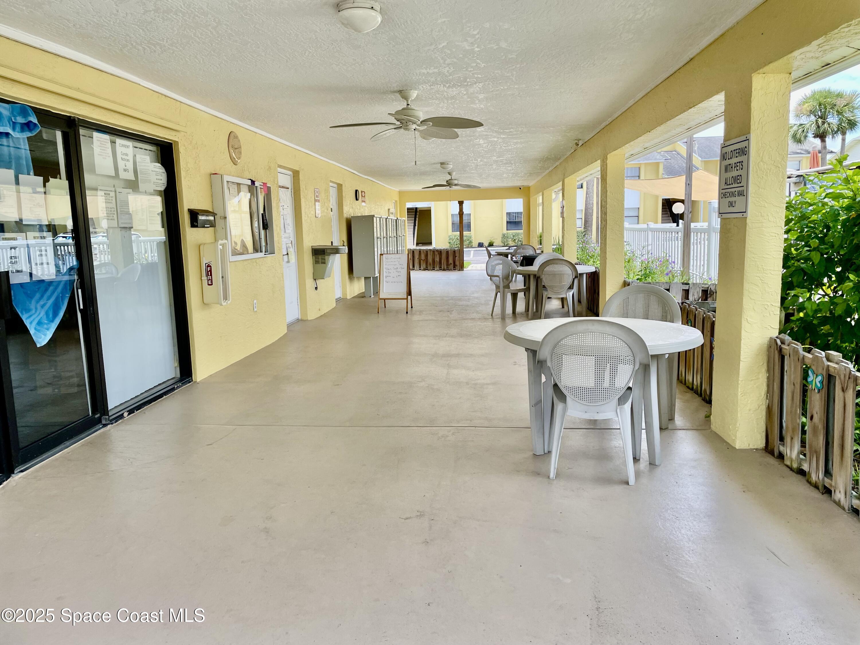 594 North Wickham Road, Unit 2 Melbourne, FL 32935 - Photo 39 of 42 a view of a dining room with furniture window and outside view