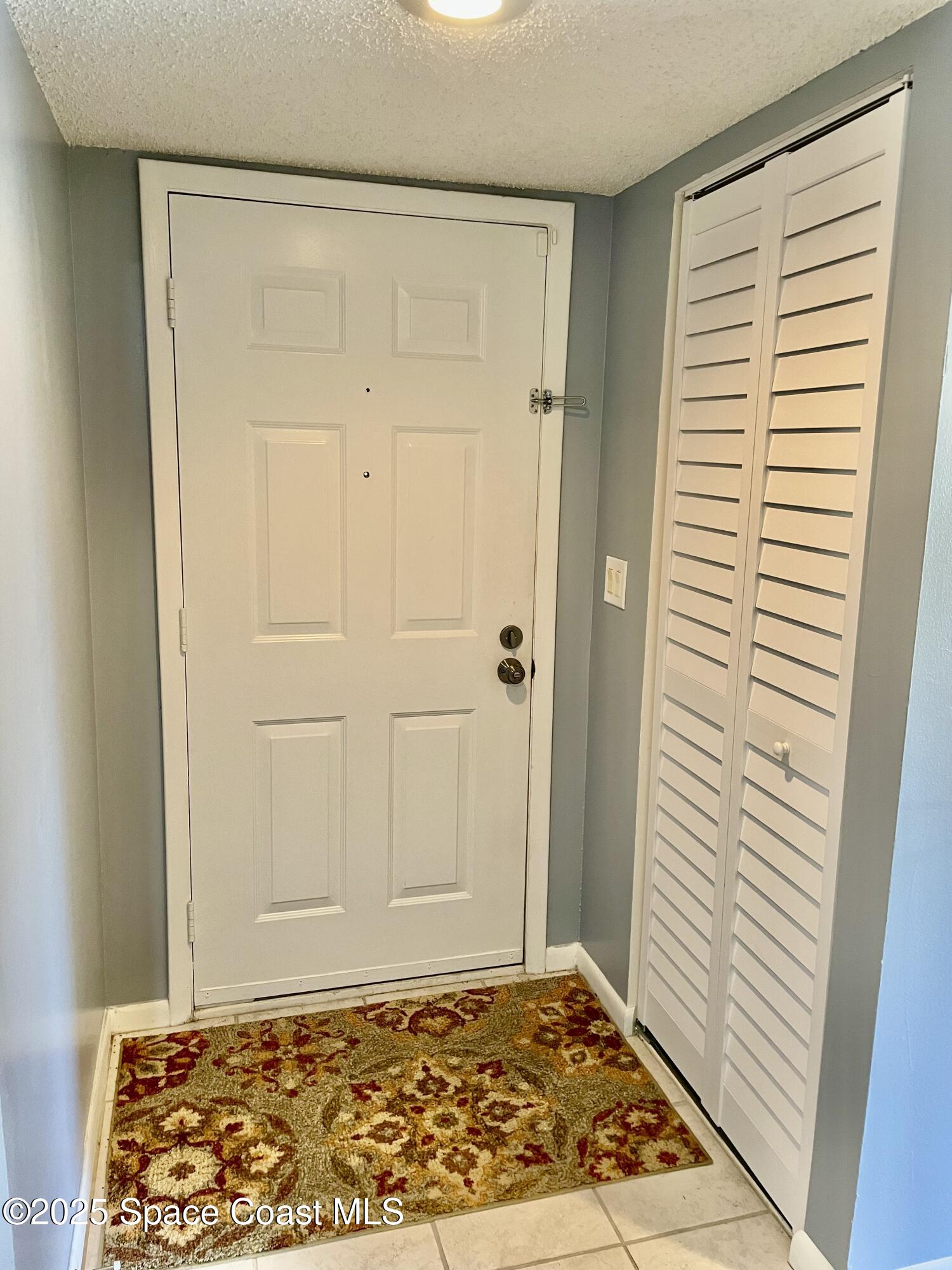 594 North Wickham Road, Unit 2 Melbourne, FL 32935 - Photo 5 of 42 a view of an empty room