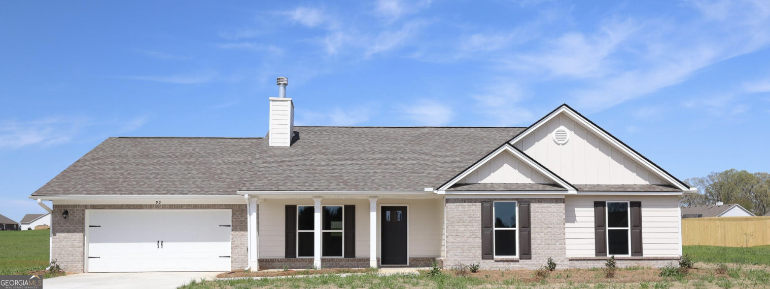 453 Tanners Bridge Road, Unit 5 Bethlehem, GA 30620 - Photo 1 of 1 a front view of a house with a yard