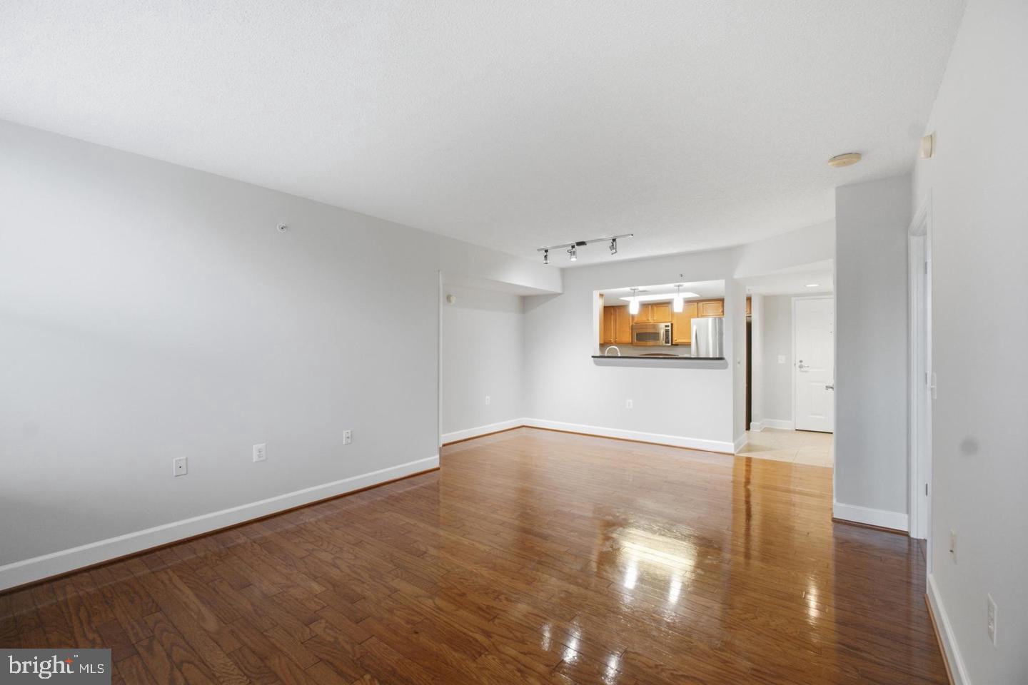 11800 Sunset Hills Road, Unit 202 Reston, VA 20190 - Photo 8 of 62 Harwood floors in Dining and Living rooms