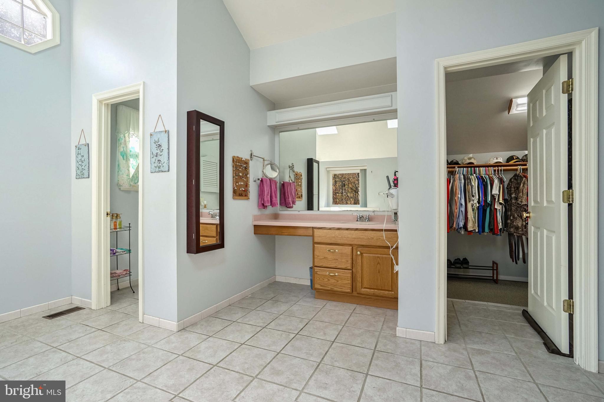 12388 Henderson Road Clifton, VA 20124 - Photo 30 of 47 2 of 2 Vanity area & 2 walk-In closets