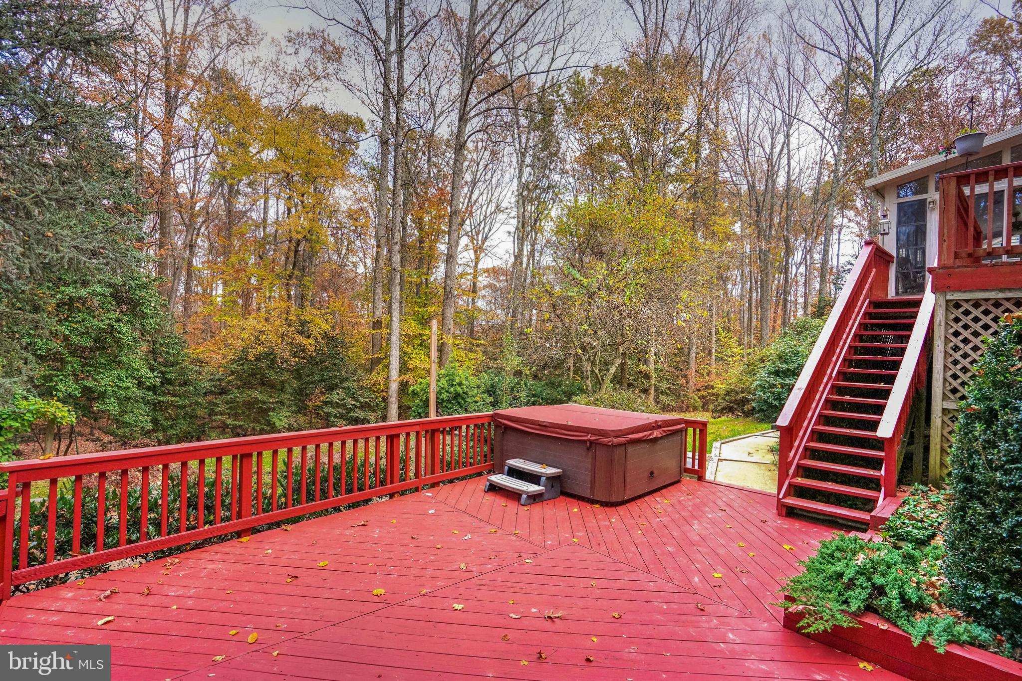 12388 Henderson Road Clifton, VA 20124 - Photo 41 of 47 Multiple Deck Areas with Jacuzzi - Conveys