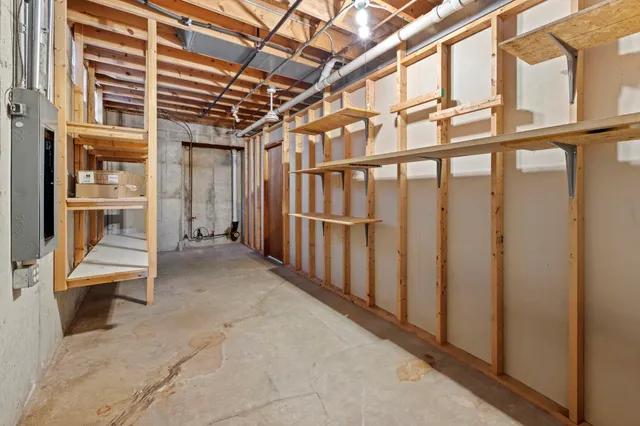 a view of a patio with table and chairs and potted plants