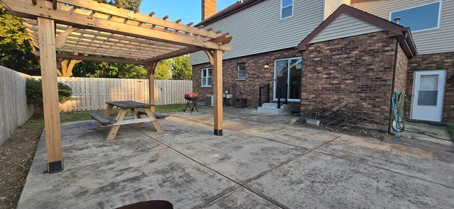 a view of a backyard with a garden