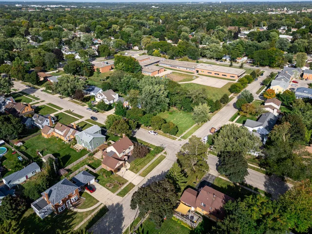 an aerial view of a city with lots of residential buildings
