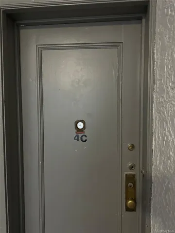 a bathroom with a glass door shower