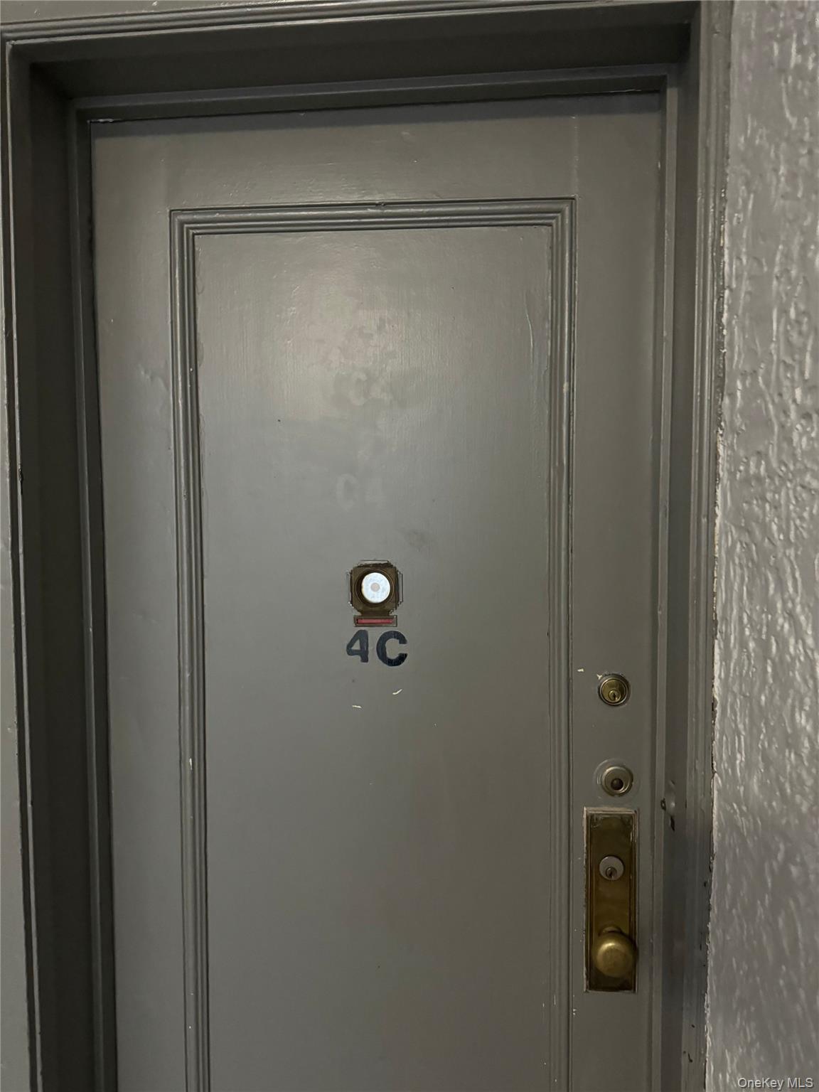 a bathroom with a glass door shower