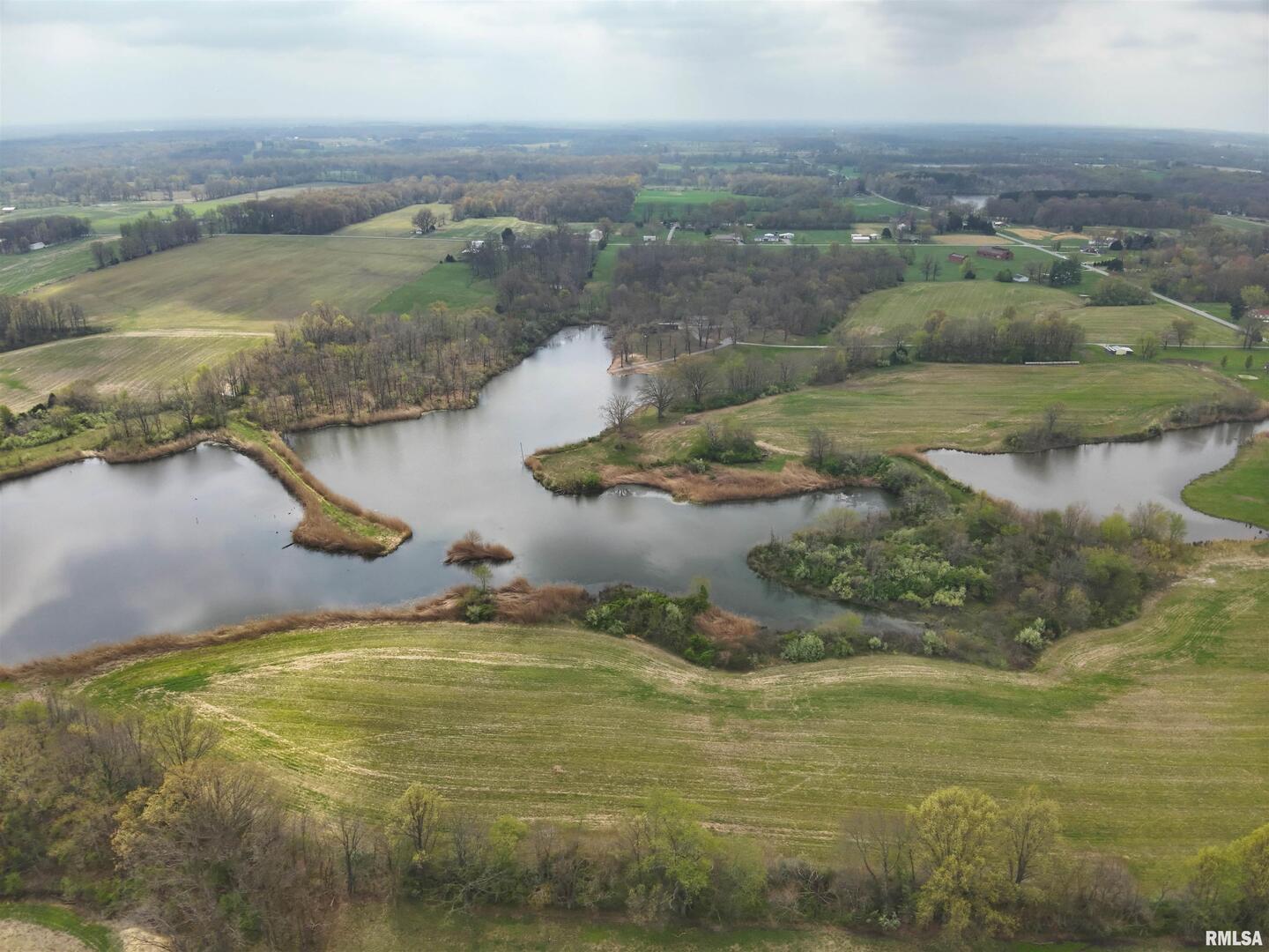 14854 Sesser Lake Road Sesser, IL 62884 - Photo 1 of 44 a view of a lake in middle of the town