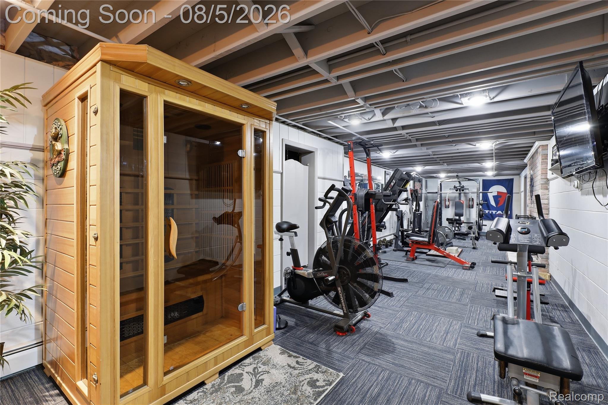 6478 West Stanley Road Mount Morris, MI 48458 - Photo 62 of 80 Dedicated fitness space featuring a built-in sauna with glass panels, textured wall finishes, recessed lighting, and patterned carpet tile flooring