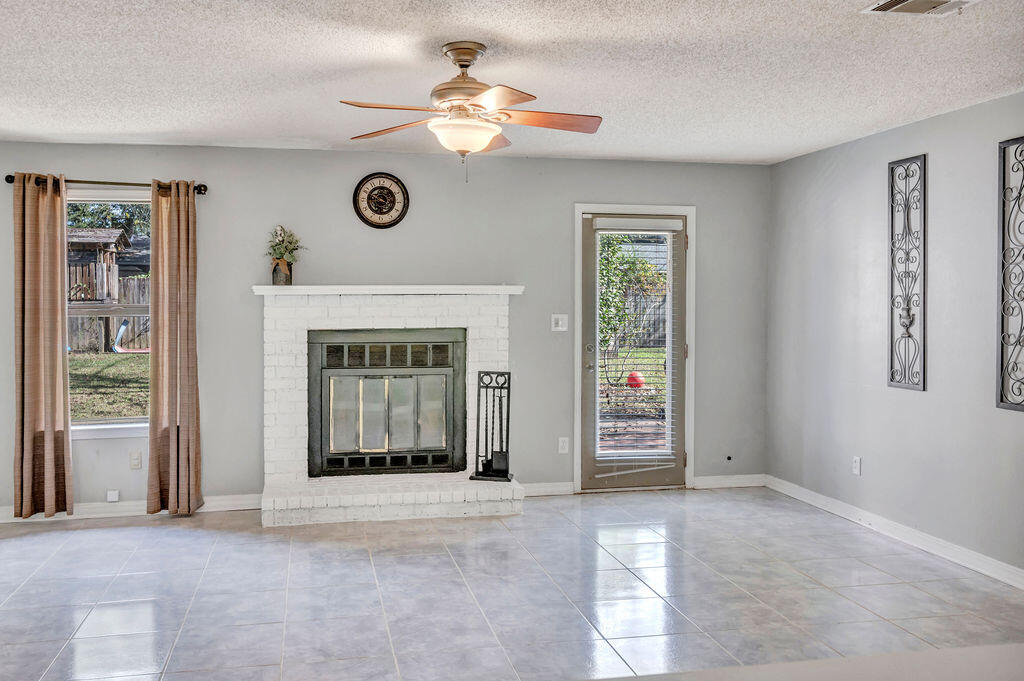 4712 Frontier Road Pace, FL 32571 - Photo 14 of 29 a view of an entryway with front door