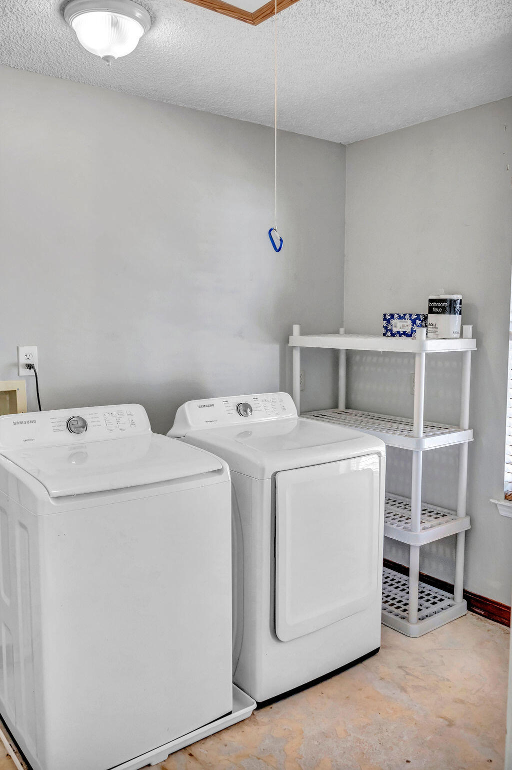 4712 Frontier Road Pace, FL 32571 - Photo 26 of 29 a utility room with dryer and washer