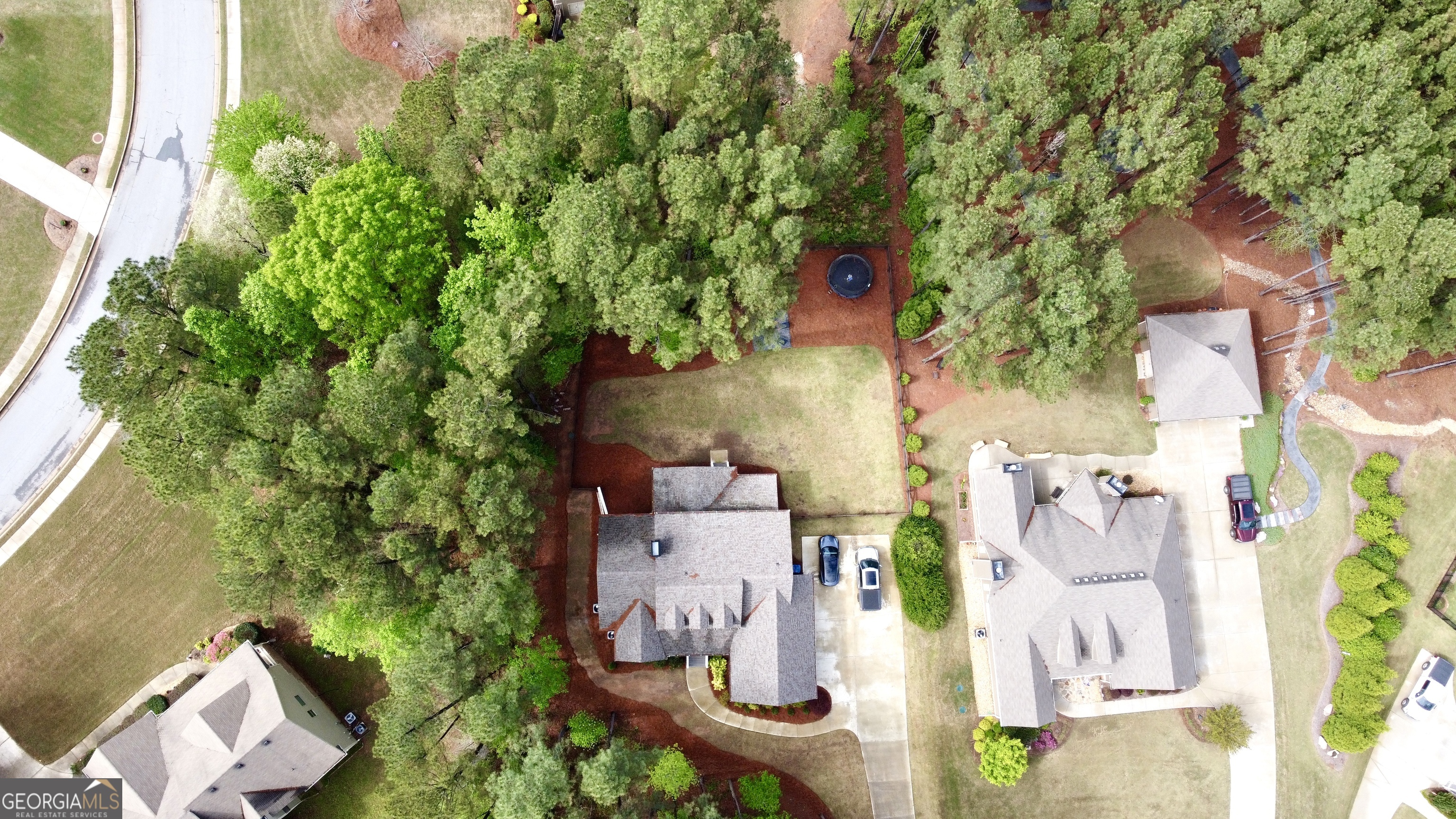 120 Spring Creek Drive Rutledge, GA 30663 - Photo 34 of 38 an aerial view of a house with a yard and fountain