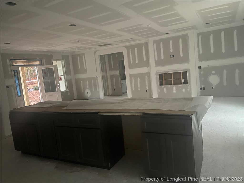 5 Gilmore Road Pinehurst, NC 28374 - Photo 3 of 19 a kitchen with a sink and a window